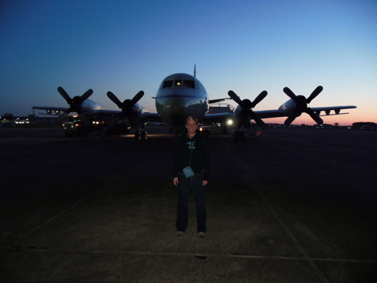 Christy Hansen stands in front of an airplane at Wallops Flight Facility in Virginia. This plane took her to Greenland this past April. Credit: Matt Linkswiler