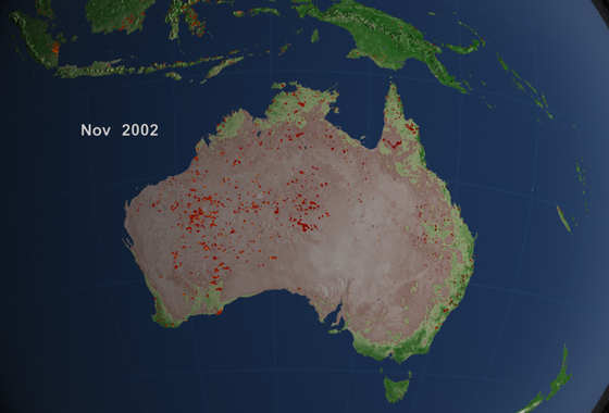 Widespread grassland fires burned large portions of of Australia's interior in 2002. The brightest fires, as observed by the MODIS instrument, are shown in orange and yellow. (Credit: NASA)