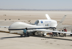 NASA's Global Hawk (pictured here) and a fleet of aircraft equipped with sophisticated sensors will fly 12 NASA campaigns around the world in 2014. From Antarctica to the Arctic, airborne scientists will study polar ice sheets, urban air pollution, hurricanes and more. Image Credit: NASA/Tony Landis
