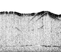 The NASA-led team used the 40-megahertz airborne sounding radar prototype to probe the desert subsurface above the Umm-El-Aish aquifer in northern Kuwait, creating this high-resolution cross section of the aquifer. The radargram shows variations in the depth of the water table from 161 to 171 feet (49 to 52 meters). Image credit: NASA/JPL-Caltech