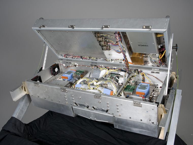The High Altitude Monolithic Microwave Integrating Circuit Sounding Radiometer, or HAMSR, developed by NASA's Jet Propulsion Laboratory is a remote-sensing instrument that is carried on NASA's Global Hawk. Credit: NASA Photo / Tony Landis