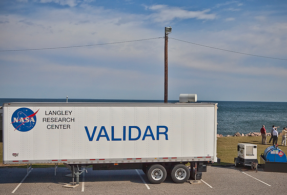 On top of the trailer, upper right, is the part of the WIND instrument that shoots a laser beam to measure winds miles offshore of Virginia Beach, Va. Credit: Sean Smith/NASA