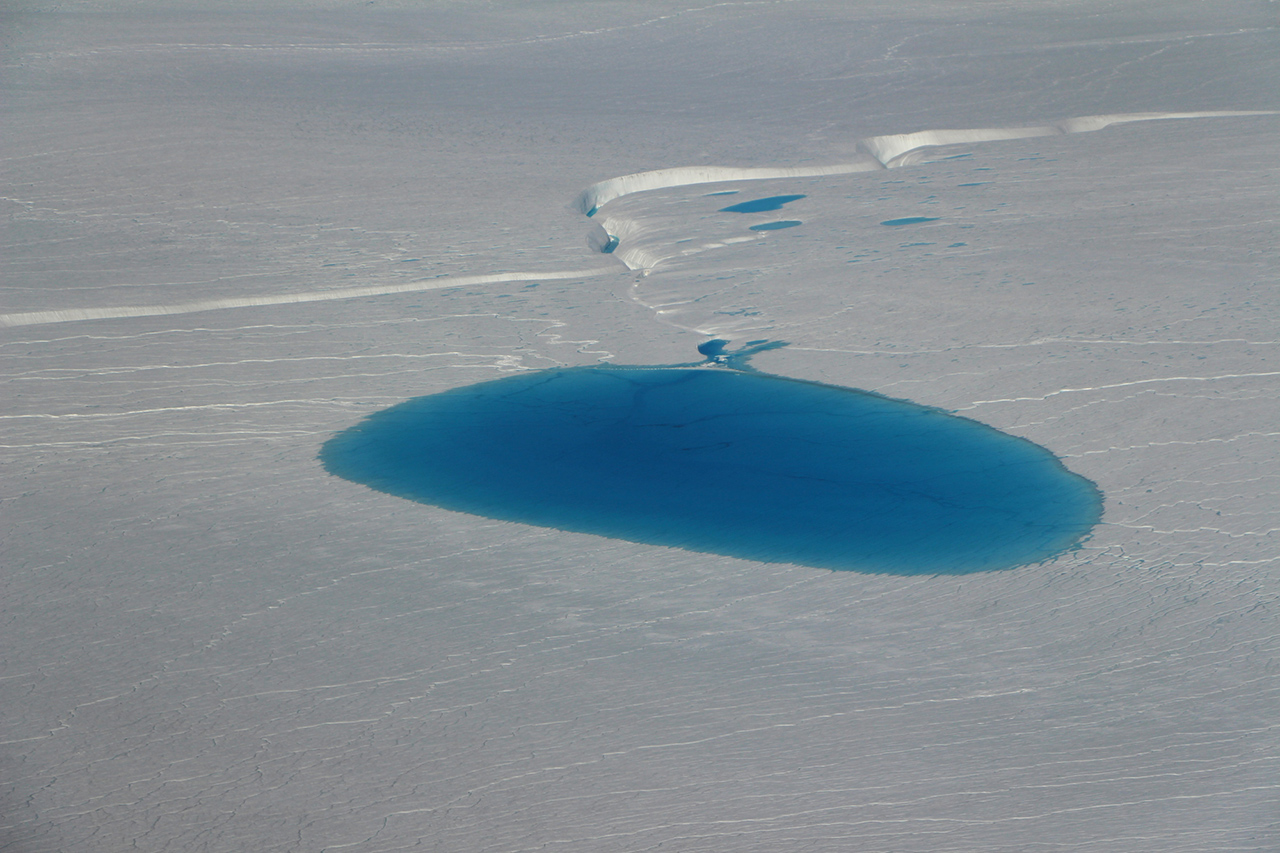 One of the dozen supraglacial lakes that Operation IceBridge surveyed to measure lake depth on July 19, 2017.
