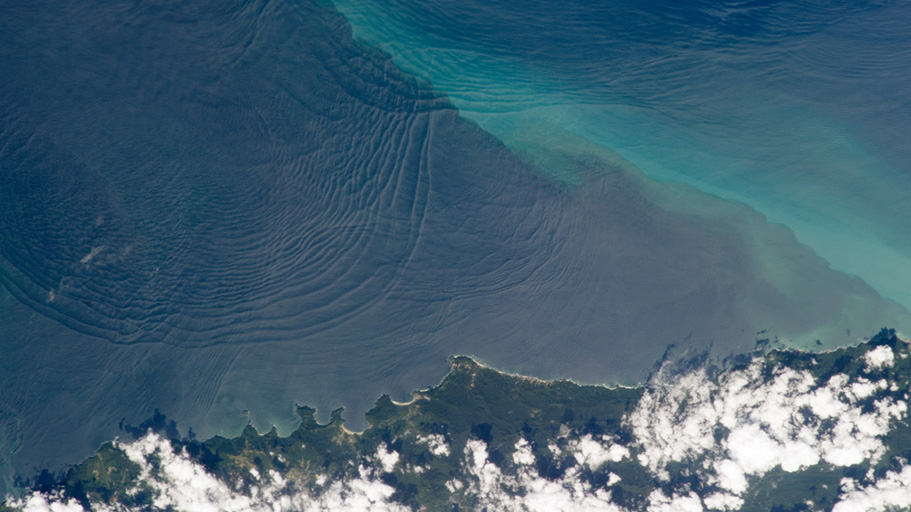 Waves swirl off the coast of Trinidad.