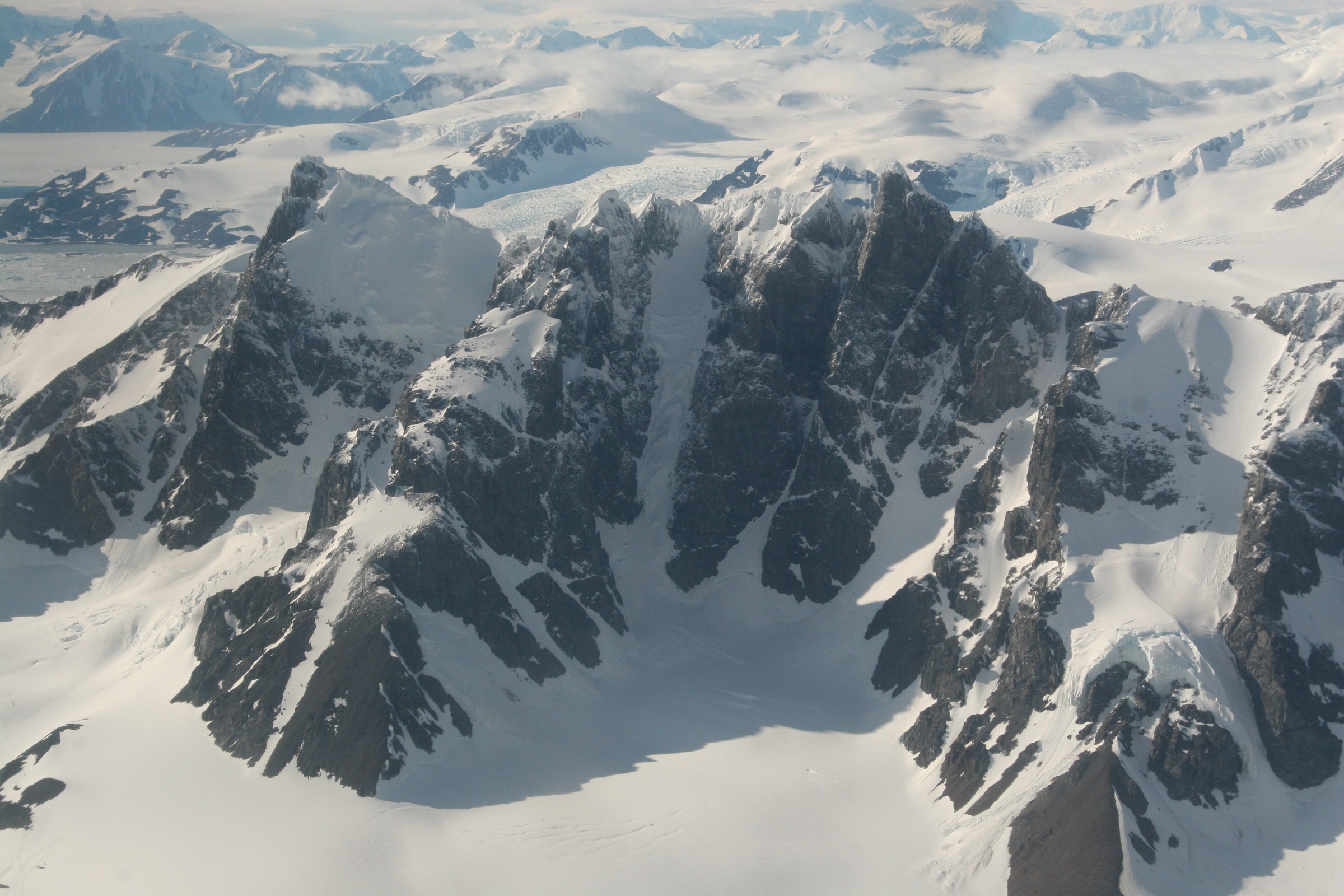 The Antarctic Peninsula from the air: although the mountains are plastered in snow and ice, measurements tell us that this region is losing ice at an increasing rate.