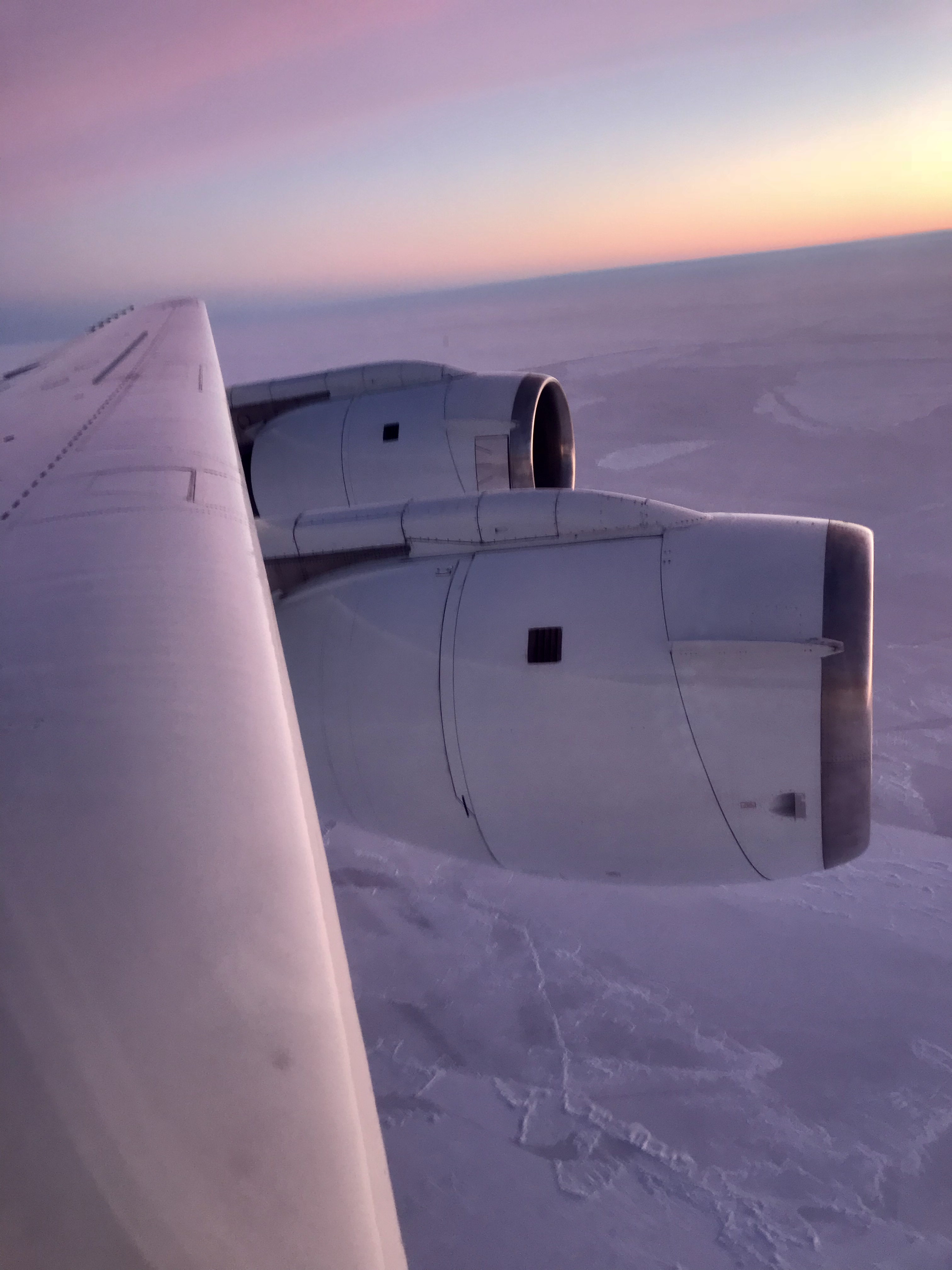 A view of NASA's DC-8 engines and wing as we were chasing the sea ice below.