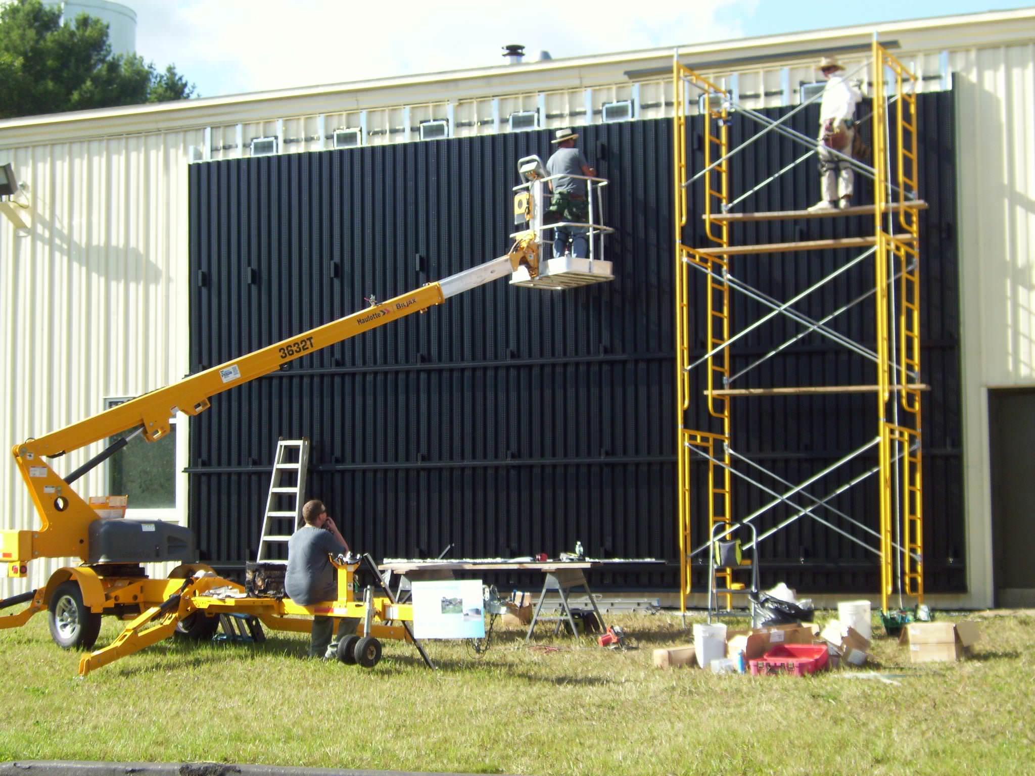 The installation of a solar wall at Wicked Joe's roastery in Maine.