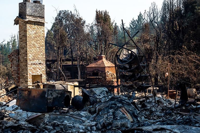 A home stands in ruins following the CZU Lightning Complex Fire in California in August 2020.