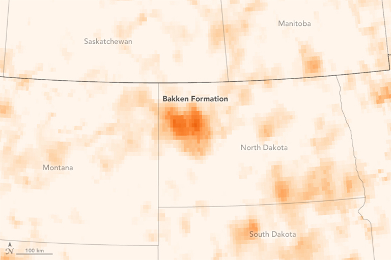 Nitrogen dioxide, an air pollutant produced by the combustion of fossil fuels, shows elevated levels of the gas over the the Bakken Formation of North Dakota. Credit: NASA's Earth Observatory.