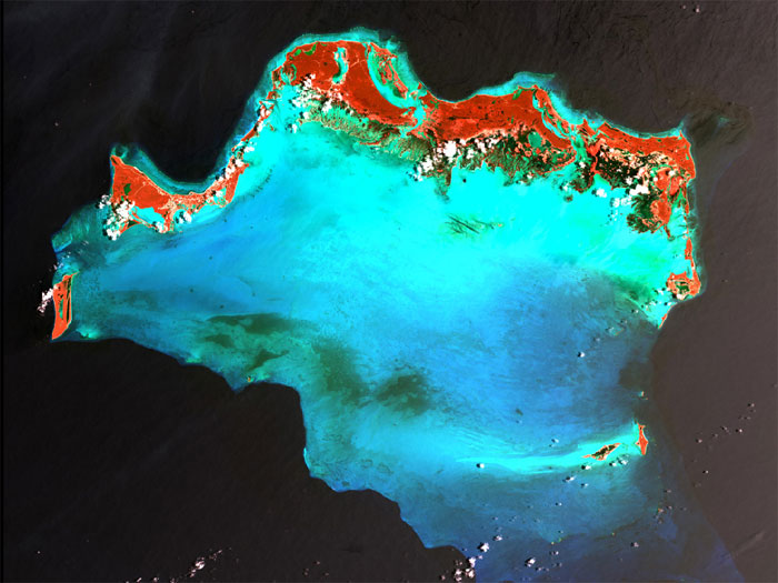 CARIBBEAN LUXURY: The Caicos Islands in the northern Caribbean are a popular tourist attraction, renowned for their beautiful beaches, clear waters, scuba diving, and luxury resorts. The islands lie primarily along the northern perimeter of the submerged Caicos Bank (turquoise), a shallow limestone platform formed of sand, algae, and coral reefs covering 2,370 square miles (6,140 square kilometers). Image taken by Landsat 7 on April 24, 2003.
