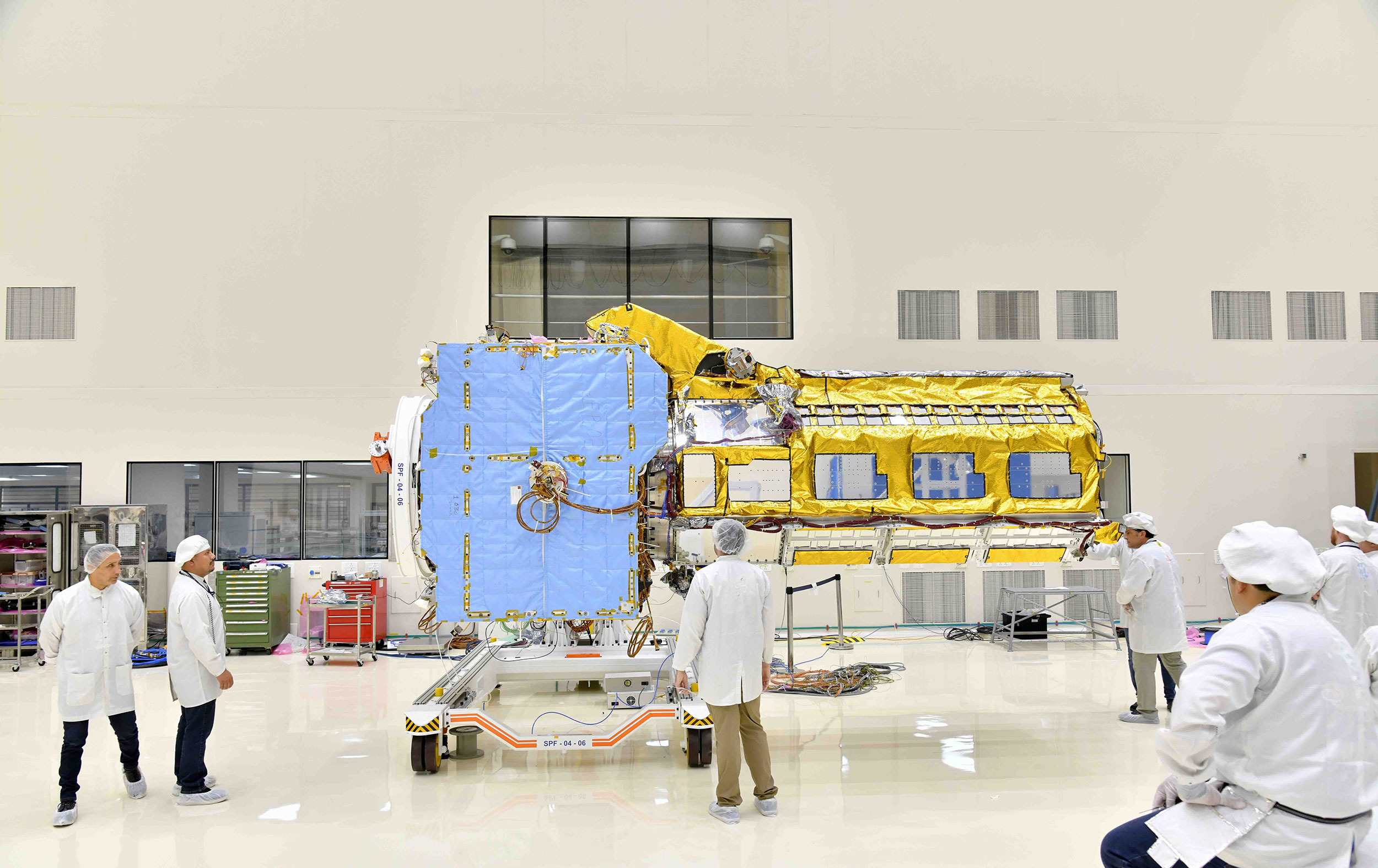 Engineers joined the two main components of NISAR – the spacecraft bus and the radar instrument payload – in an ISRO clean room in Bengaluru, India, in June. The payload arrived from NASA’s Jet Propulsion Laboratory in Southern California in March, while the bus was built at the ISRO facility. Credit: VDOS-URSC
