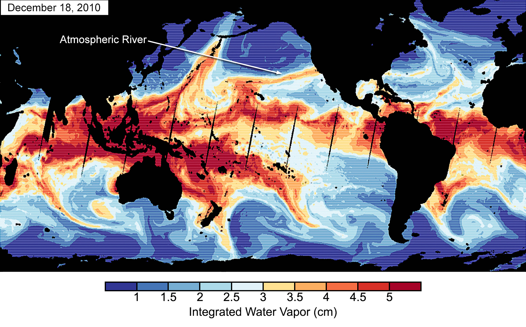 Satellite water-vapor measurements from Dec. 18, 2010, show an atmospheric river making landfall in California. Continents appear in black. The belt of very moist air (red) centered on the equator is the reservoir that supplies atmospheric rivers. On this date, the AO and PNA were both in their negative phases. Water vapor data from the Special Sensor Microwave Imager and the Special Sensor Microwave Imager/Sounder instruments on Defense Meteorological Satellite Program satellites. Image credit: Bin Guan, NASA/JPL-Caltech and UCLA.