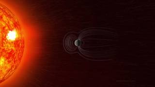 The Sun expels a constant outflow of particles and magnetic fields known as the solar wind and vast clouds of hot plasma and radiation called coronal mass ejections. This solar material streams across space and strikes Earth's magnetosphere, the space occupied by Earth's magnetic field, which acts like a protective shield around the planet.