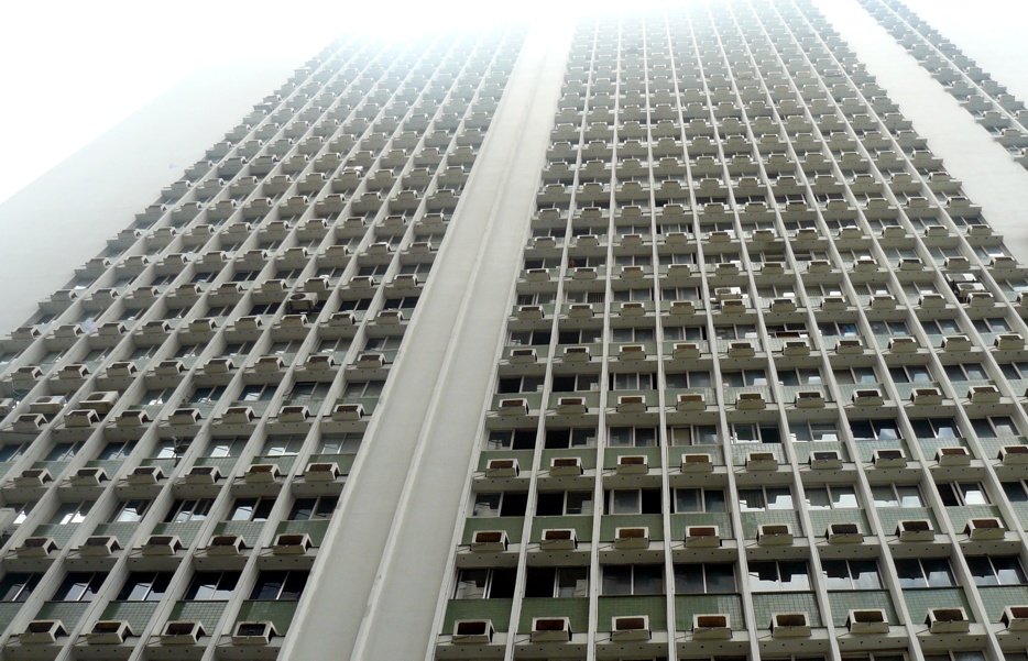A building with many air conditioners installed