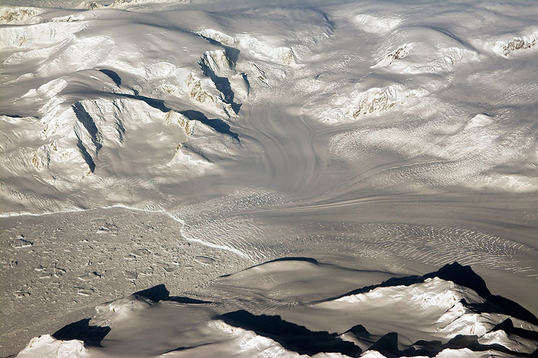 Glaciers seen during NASA's Operation IceBridge research flight to West Antarctica on Oct. 29, 2014. Credit: NASA/Michael Studinger. View larger image.