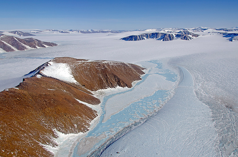 Refrozen meltwater ponds in northeast Greenland seen during an April 2013 IceBridge flight. Credit: NASA/Michael Studinger