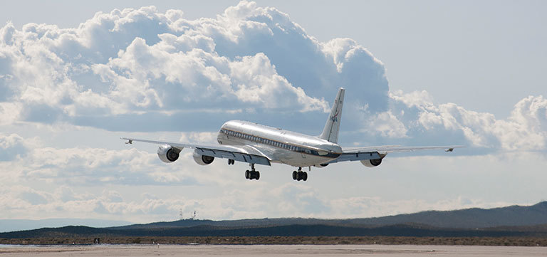 NASA's DC-8 aircraft takes off from its base operations in Palmdale, California, on a mission aimed at studying polar winds in the Arctic region. Credit: NASA Photo / Carla Thomas. View larger image.