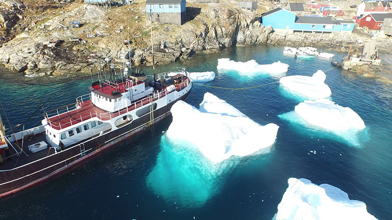 The M/V Cape Race at Kullorsuaq, Greenland, picks up fresh drinking water. Credit: Justin Fenty
