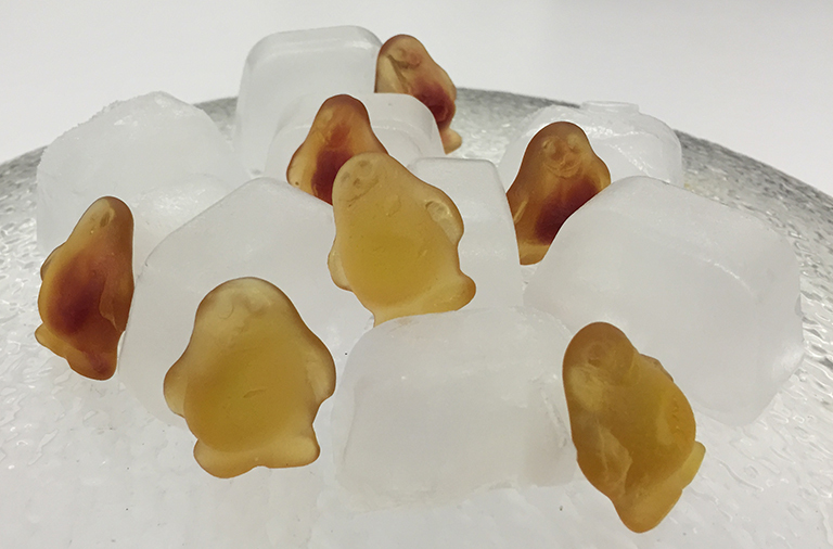 Not quite real penguins on a not quite real ice floe.