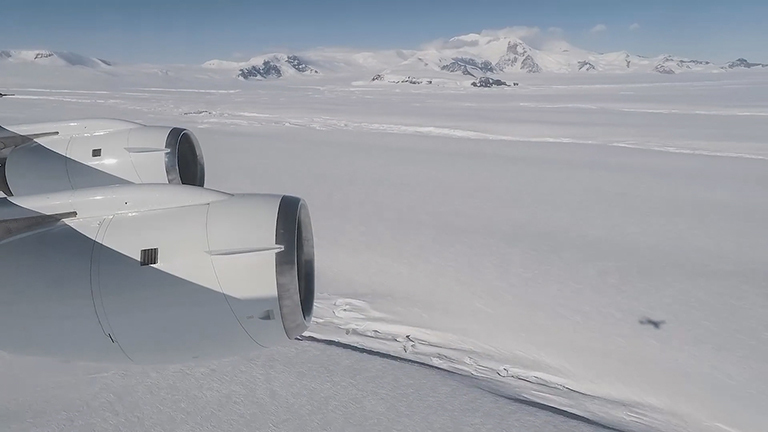 A view from Operation IceBridge's aircraft of Crosson Ice Shelf, foreground. Mt. Murphy is in the background. Credit: NASA/OIB/Michael Studinger.