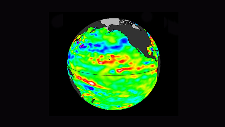 Data collected Feb. 28 – March 12, 2017, by the U.S./European Jason-3 satellite show near-normal ocean surface heights in green, warmer areas in red and colder areas in blue. Ocean surface height is related in part to its temperature, and thus is an indicator of how much heat is stored in the upper ocean. Credit: NASA/JPL-Caltech.
