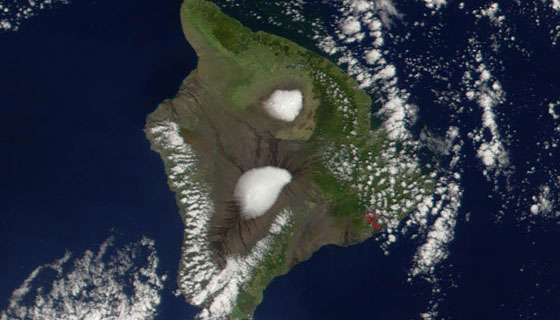 Aerial view of  Hawaii's Mauna Loa (center), the world's largest volcano.  The CU-Boulder-led research group's experiments at Mauna Loa will provide important clues for understanding how changes in the water cycle influence changes in atmospheric circulation and global temperatures.
