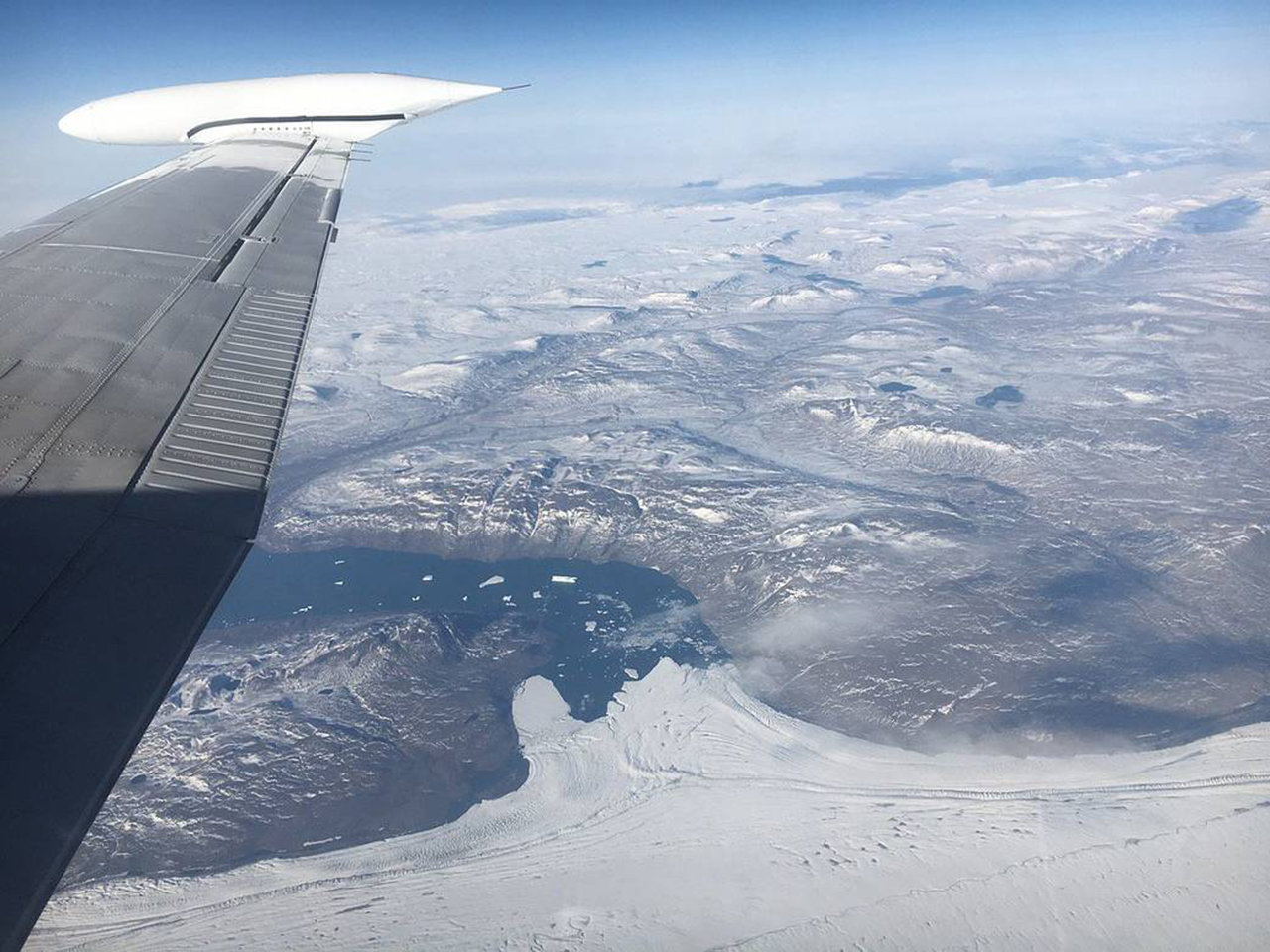 This photograph was taken on Aug. 29, 2017, from 28,000 feet, looking north while surveying Nioghalvfjerdsbrae (79 N) Glacier in northeast Greenland.