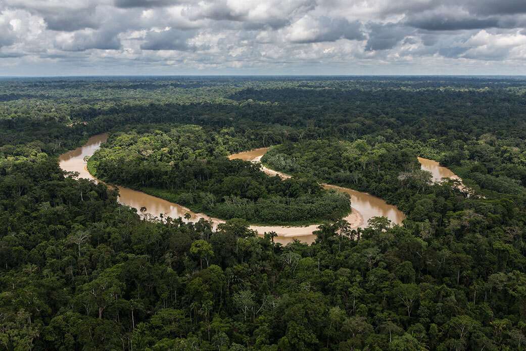 A river snakes its way through the Amazon rain forest in Peru.