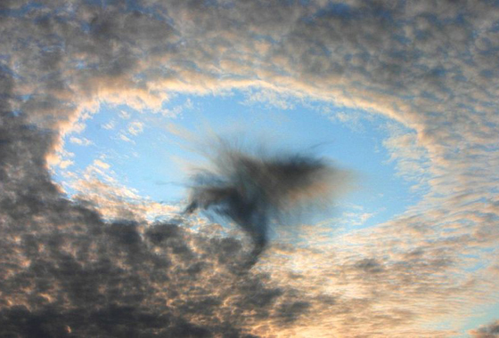 A hole punch cloud observed on August 17, 2008 near Linz, Austria. Credit: H. Raab