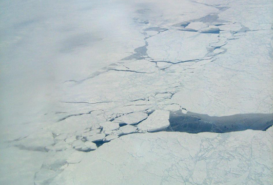A new airborne study with NASA contributions measured surprising levels of the potent greenhouse gas methane coming from cracks in Arctic sea ice and areas of partial sea ice cover. This image was taken over the Arctic Ocean at a latitude of approximately 71 degrees North on April 15, 2010. Credit: NASA/JPL.