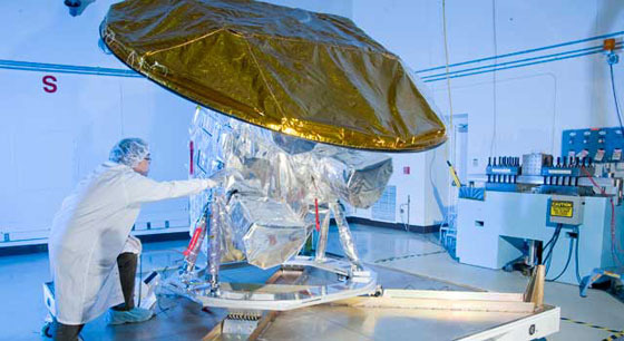 An engineer checks JPL's Aquarius instrument.