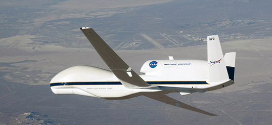 NASA's Global Hawk remotely operated Earth science aircraft No. 872 banks right over Edwards Air Force during a checkout flight. (NASA / Carla Thomas)