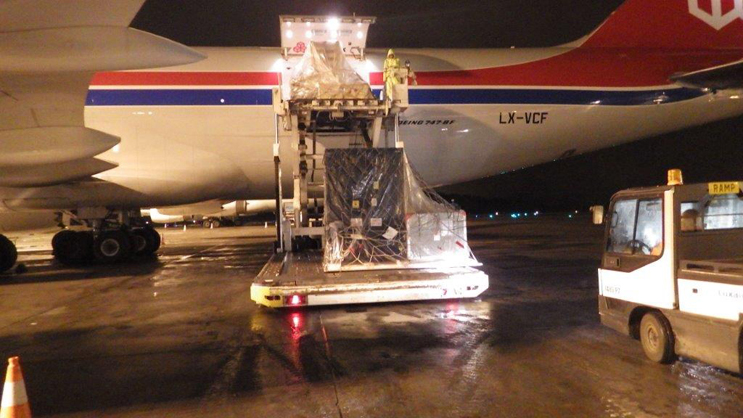 The three NASA-built instruments and associated ground support equipment for the U.S./European Jason-3 ocean altimetry satellite are removed from a Cargo Lux 747-800 transport plane in Luxembourg on May 21, 2013, following a transatlantic flight. Image credit: NASA/JPL-Caltech